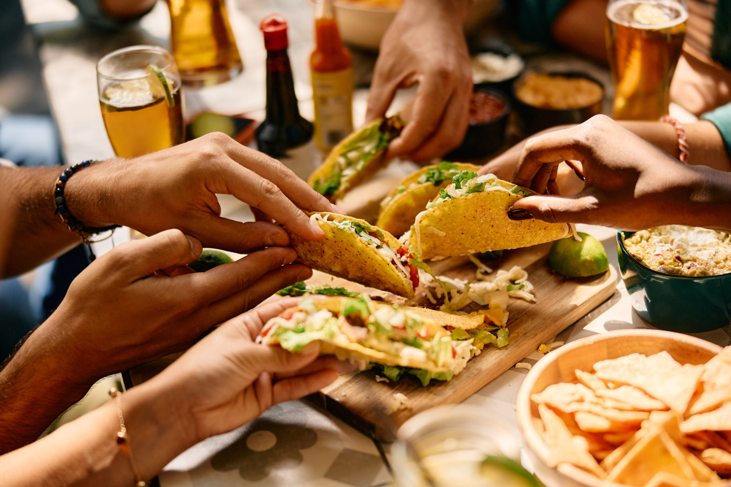 Close up of people eating Mexican at their luxe haus vacation rental