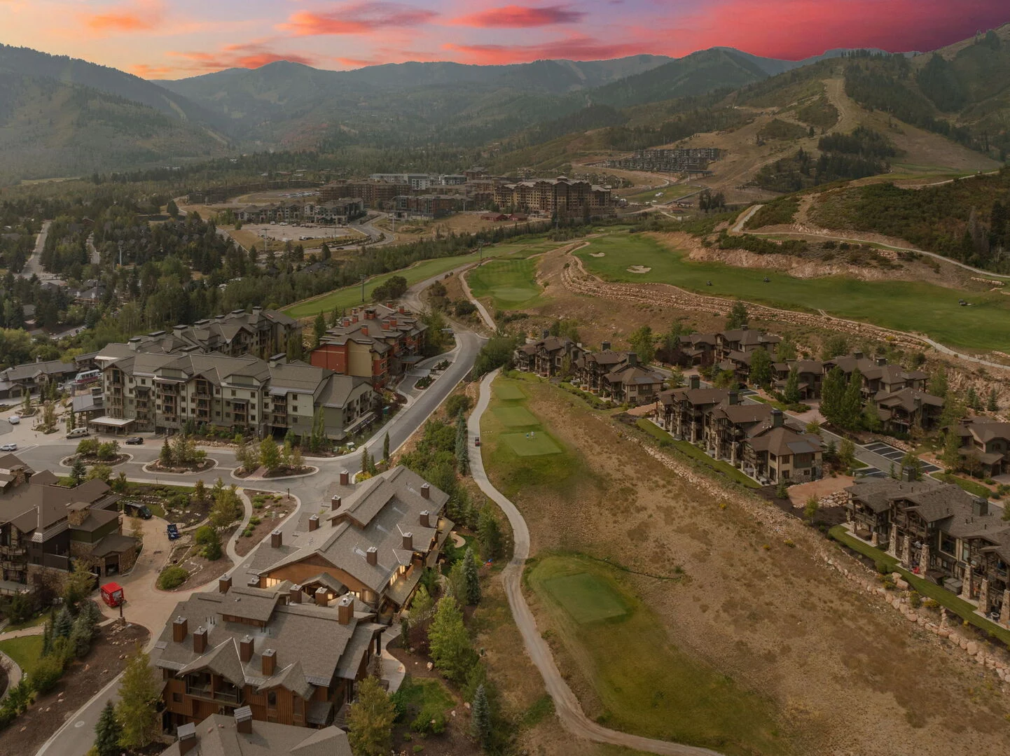Juniper landing with a view of the sunset and the hills of Deer Valley in the distance