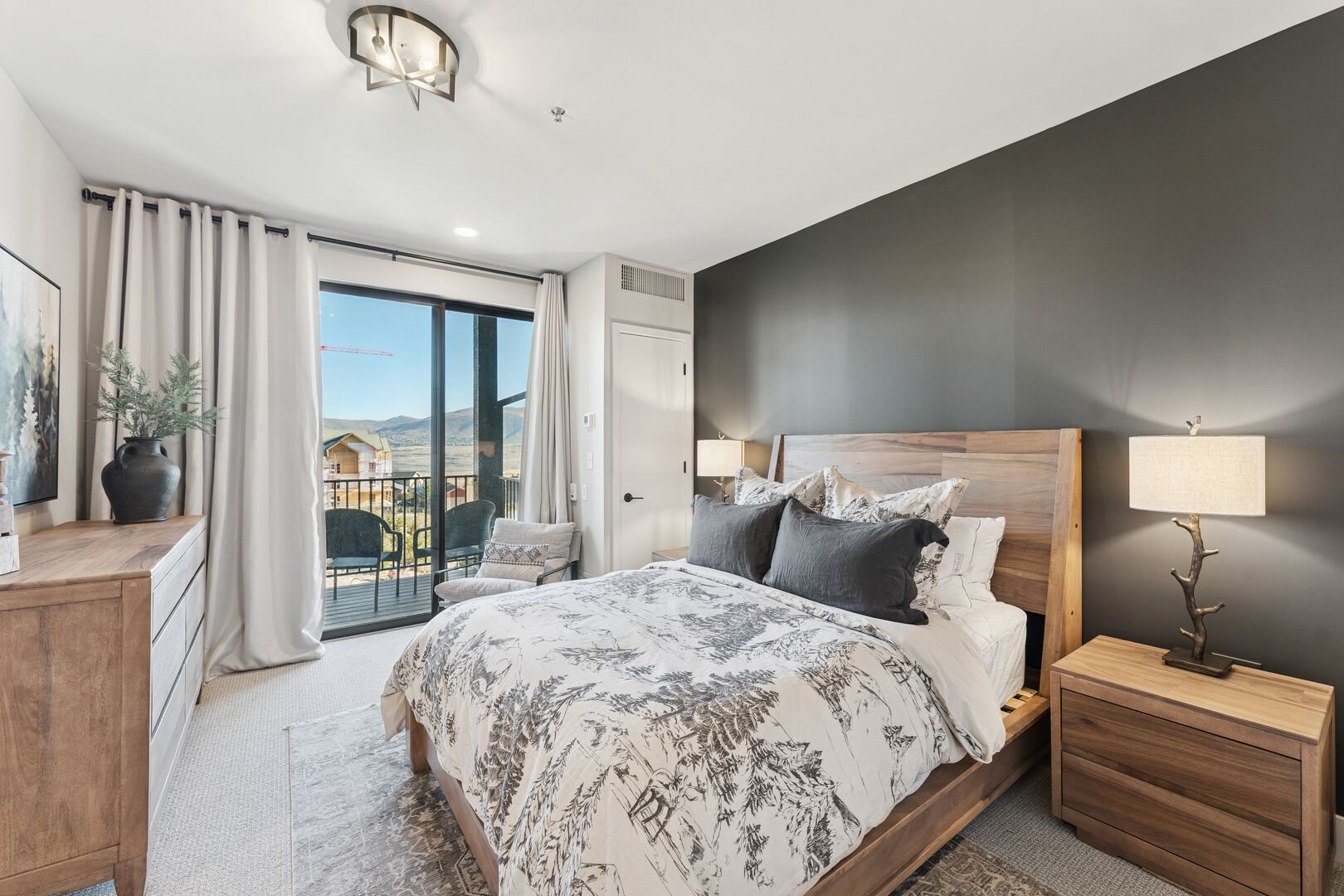 A designer decor bedroom of The Mason 3026 in Deer Valley with mountain views