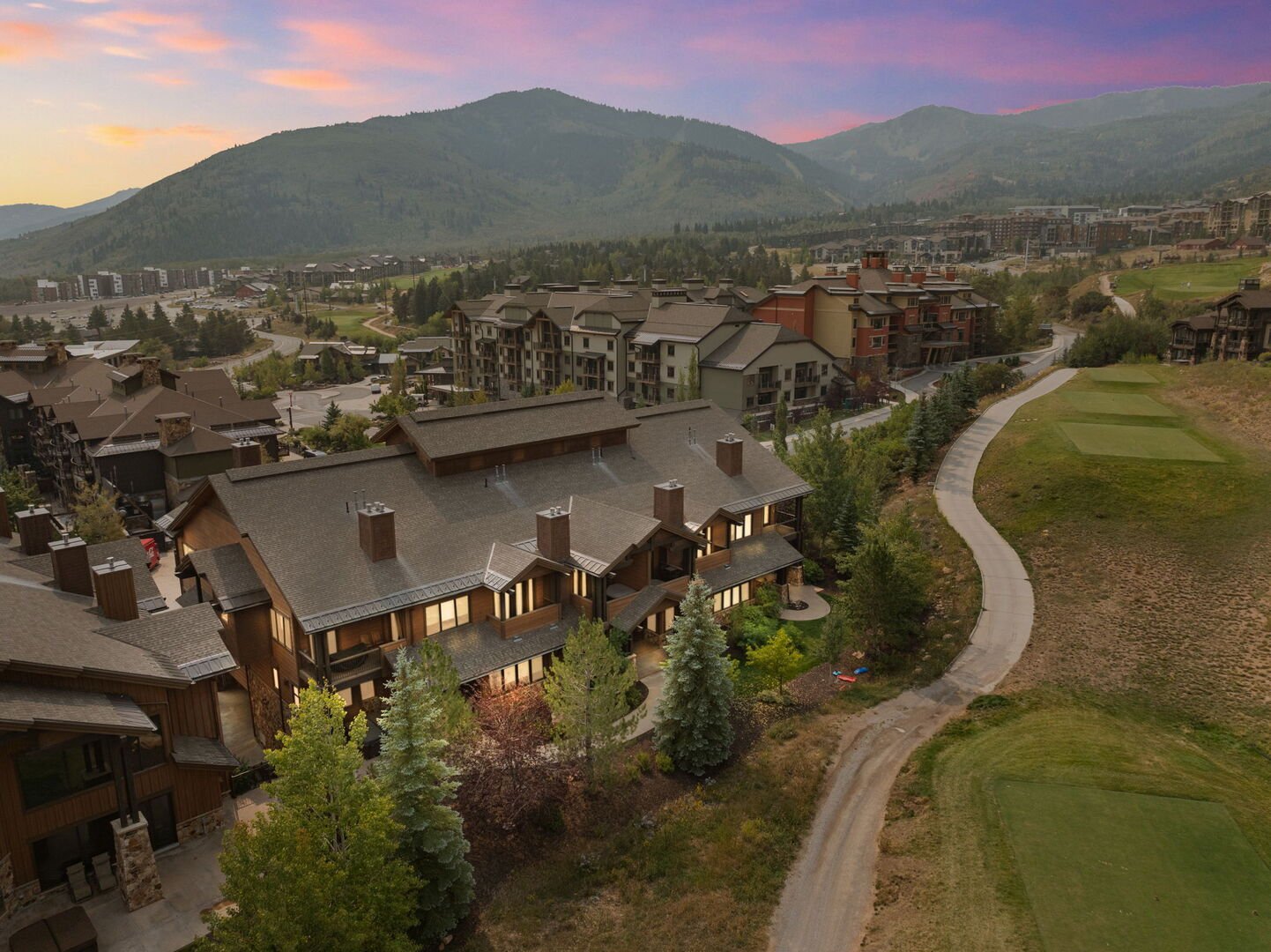 aerial view of juniper landing 108 with the mountains of park city in the distance