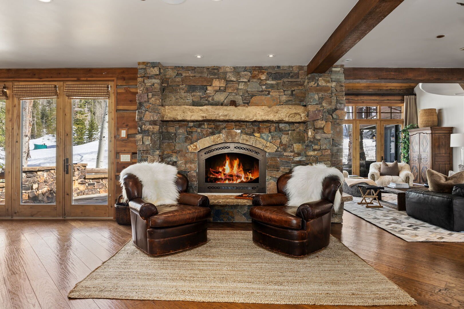 a cozy seating area by the fire in ski utah home
