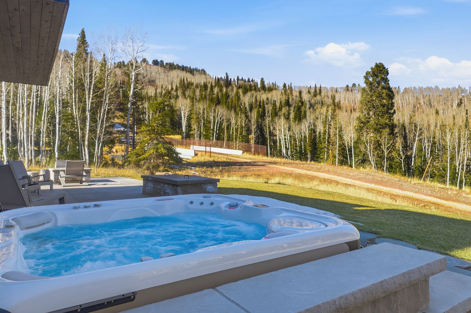 the view from the back hot tub of the mountains of Park City