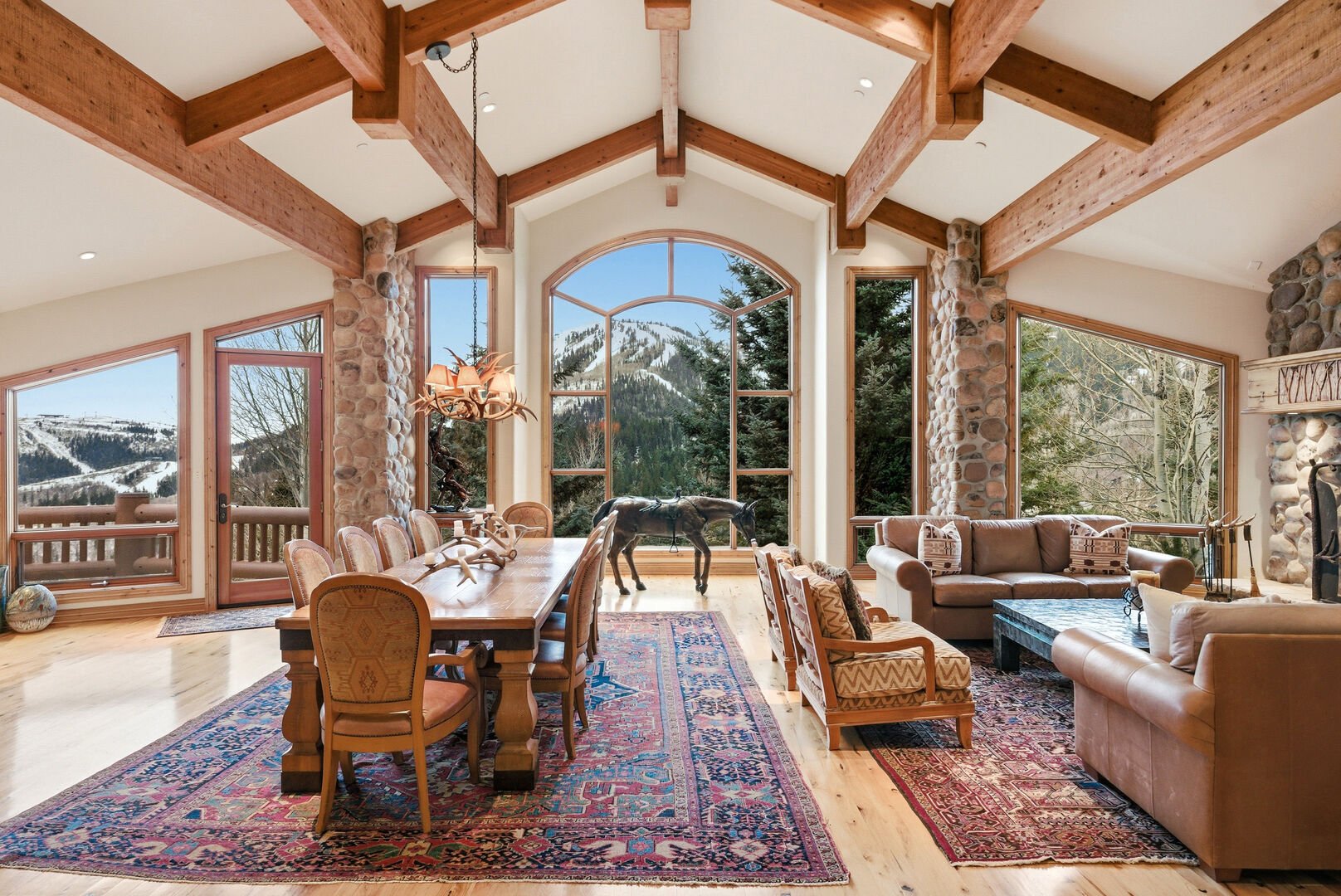 Views of the deer valley slopes from in side the luxury living room of Summit View Lodge