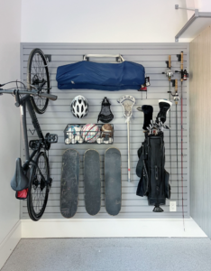 a gear closet with bike and skatboards