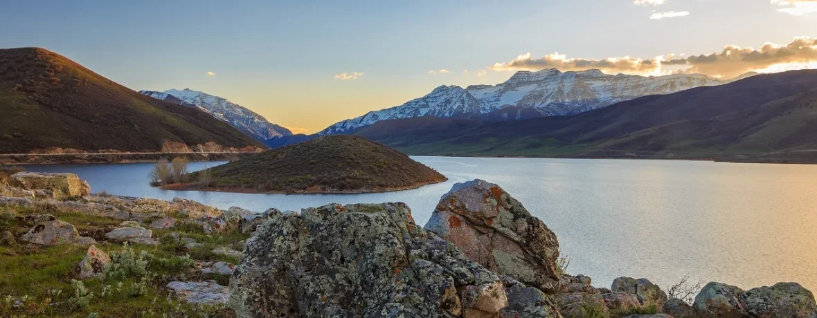 a view of deer creek reservoir at sunset